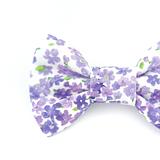 Purple and white dog bow tie with flower print