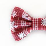 part of a red Christmas dog bow tie